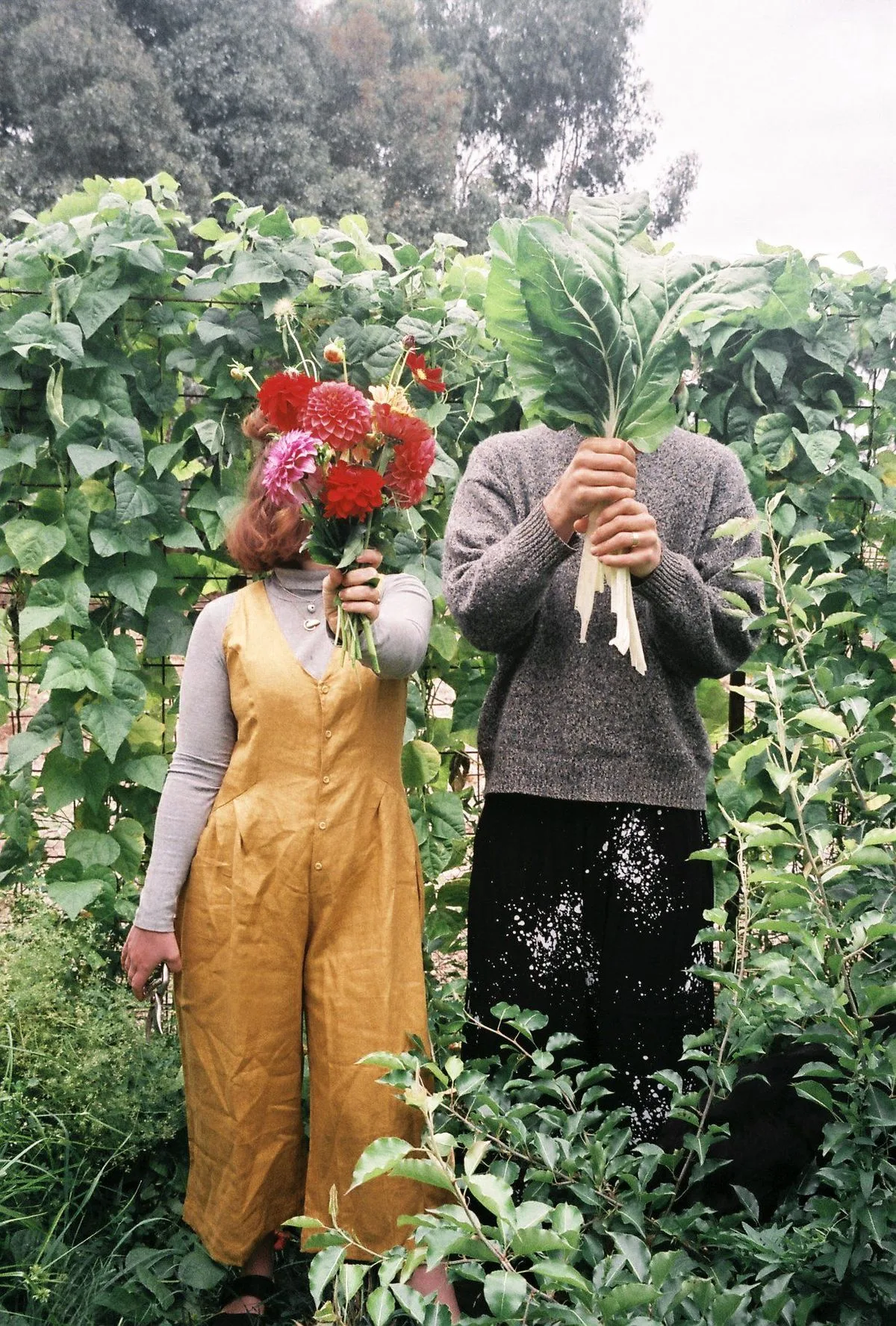 David and Adrian, the Bloom founders, holding flowers